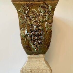 Large Pottery Vase with Three Dimensional
Grapes Motif On Front.